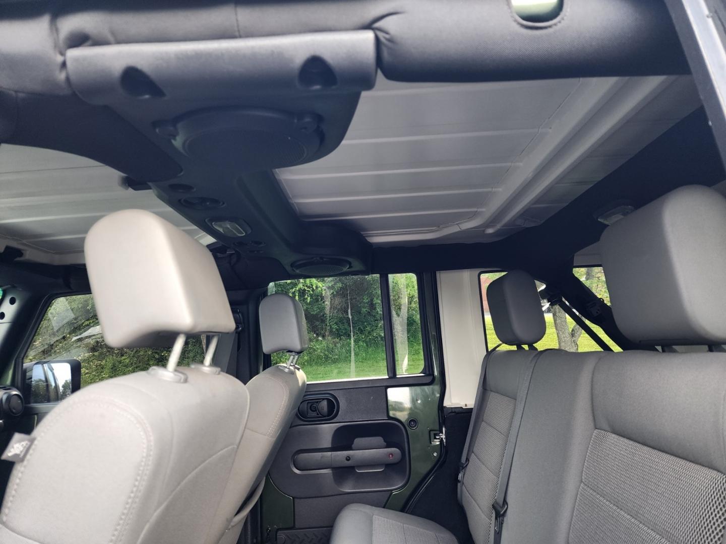 2008 Green /Black Jeep Wrangler Unlimited Rubicon (1J4GA69158L) with an 3.8L V6 OHV 12V engine, Automatic transmission, located at 1221 Madison St., Shelbyville, TN, 37160, (931) 680-9439, 0.000000, 0.000000 - Photo#4